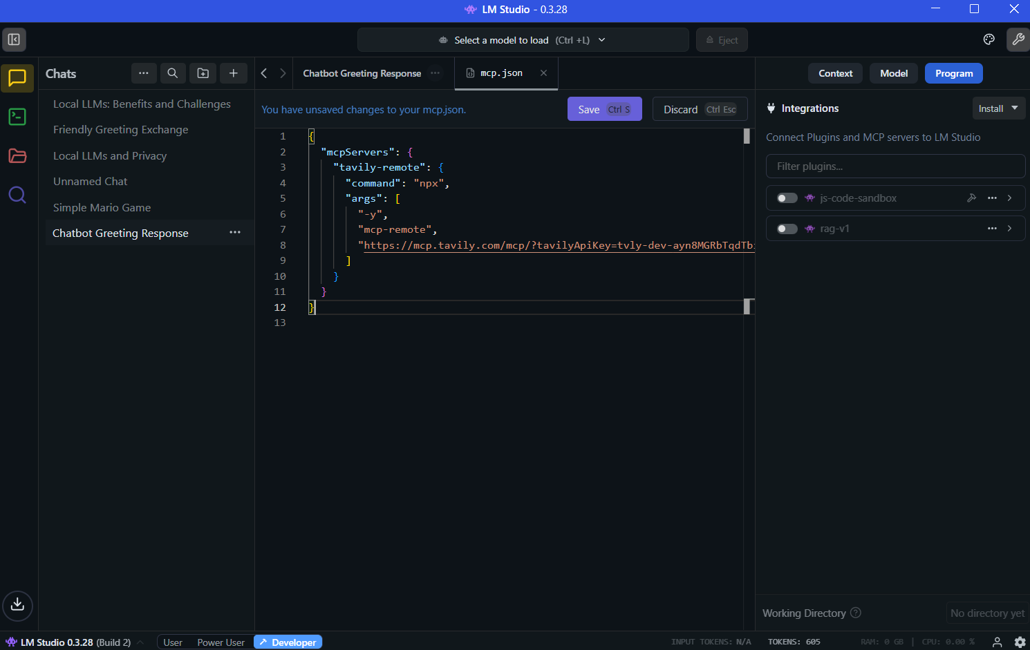 Edit mcp.json file and add Tavily MCP server configuration with API key replacement